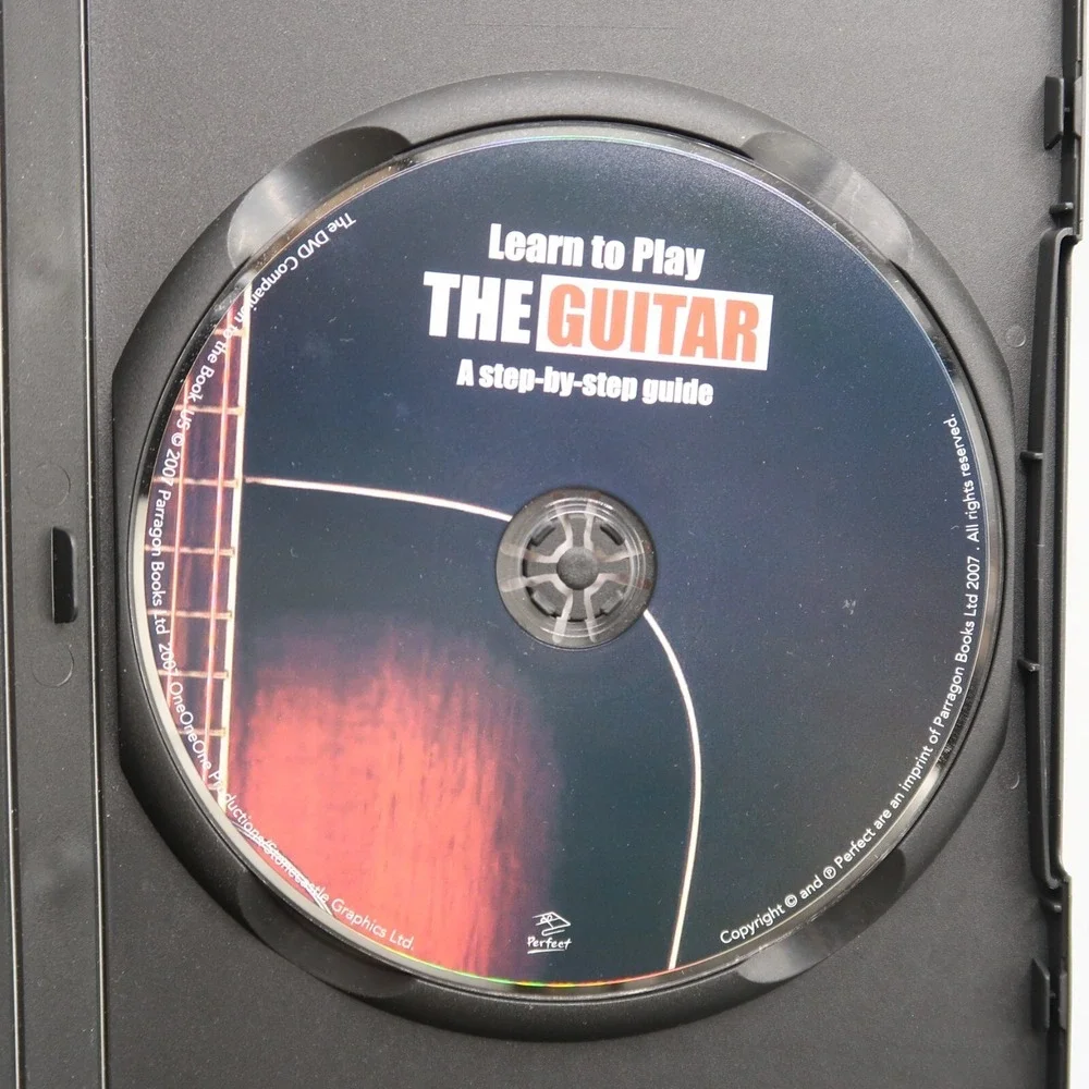 Learn to Play the Guitar Book with‎ Dvd Comprehensive With Illustration